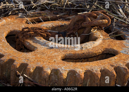 Closeup of a powdery scaly ship`s gear cog on Broughty Ferry beach in Dundee Scotland UK Stock Photo